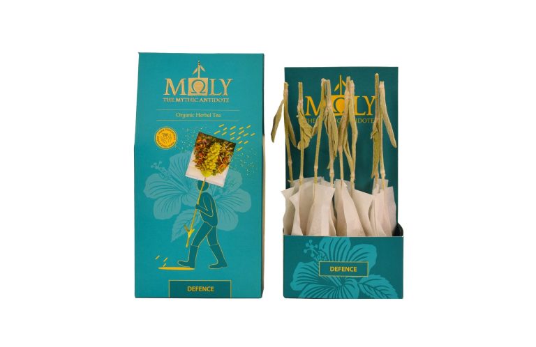 Verpackung mit beige-weißen Teebeuteln und abgebildeten, stilisierten Figuren.